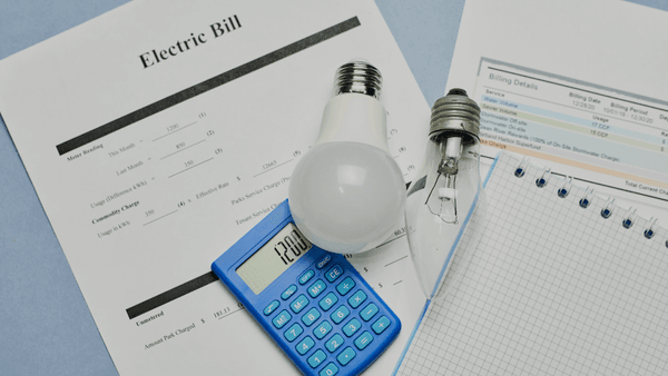 Getting Connected in New Zealand - Person setting up mobile phone, internet and utilities in new NZ home