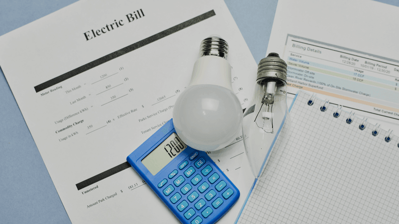 Getting Connected in New Zealand - Person setting up mobile phone, internet and utilities in new NZ home